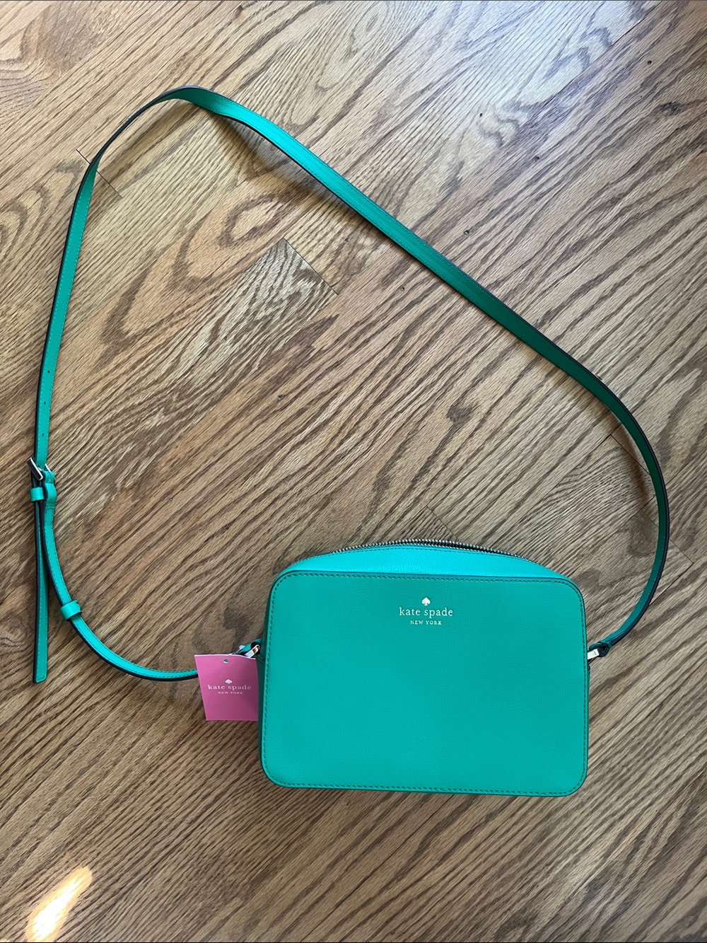 kate spade green crossbody bag with gold logo